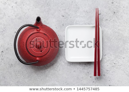 Stok fotoğraf: Empty Plate Cup Teapot And Chopsticks