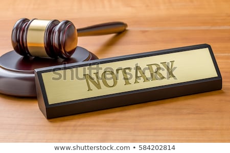 Foto stock: A Gavel And A Name Plate With The Engraving Contract Law