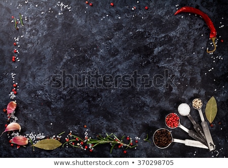 Stockfoto: Salt With Frame Of Bay Leaf Background