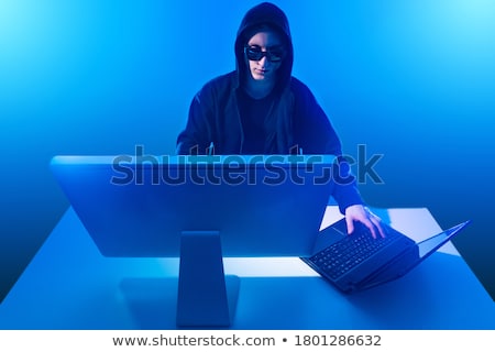 Zdjęcia stock: Hooded Computer Hacker Working On Desktop Pc Computer