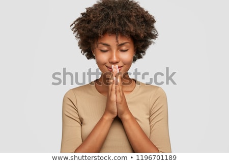 Stock photo: Hopeful Young Beautiful Woman Posing Isolated