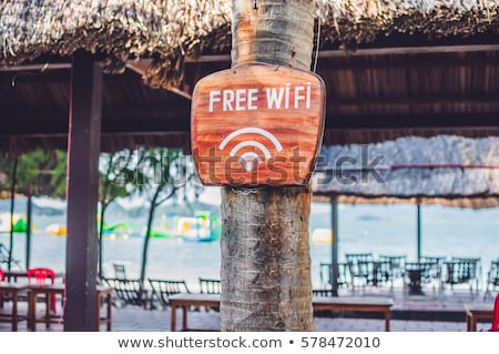 ストックフォト: Free Wifi Arrow On The Beach