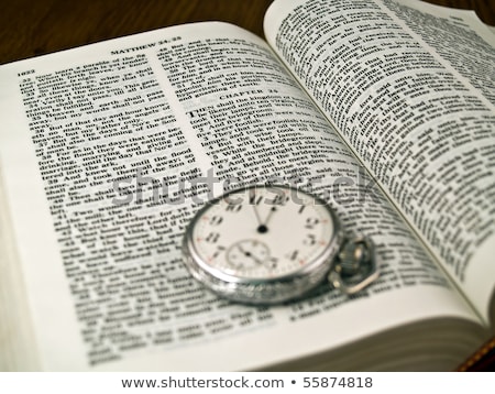 Stock photo: The Bible Opened To Matthew 24 36 With A Pocketwatch