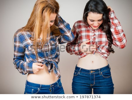 Stock fotó: Blonde Woman Showing Belly Button