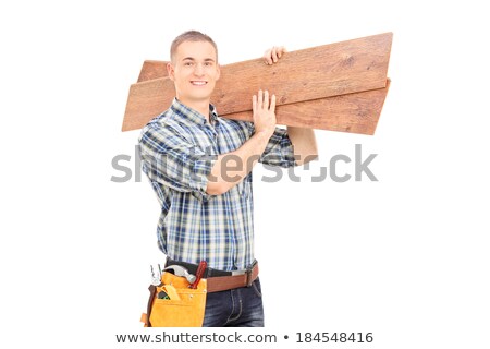 Stock photo: Man Carrying Planks Over Shoulder