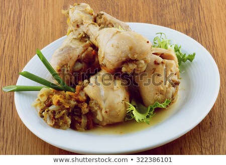 Foto d'archivio: Roasted Chicken Legs Vegetables Saute And Greens