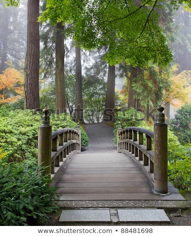 ストックフォト: Finial On Wooden Bridge In Japanese Garden