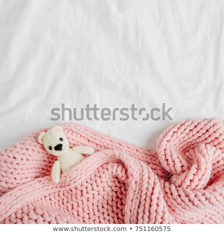 Foto d'archivio: Birthday - Beautiful Girl Laying In White Bed With Teddy Bear