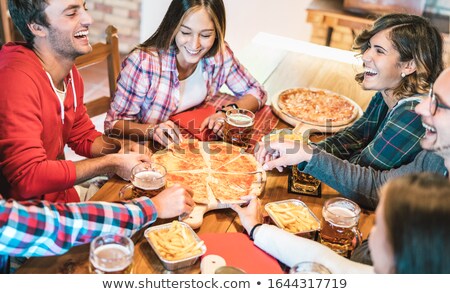 ストックフォト: Family In A Bar And Pizzeria