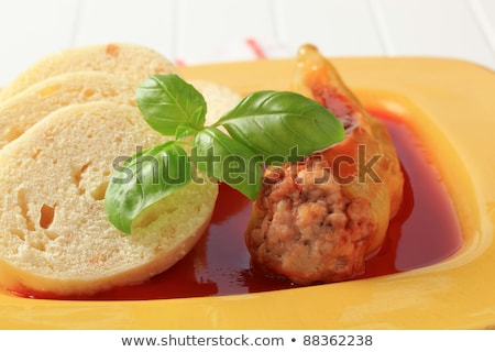 Foto stock: Stuffed Pepper With Tomato Sauce And Dumplings