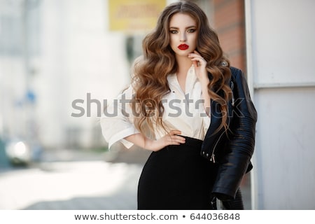 Stock foto: Fashionable Beautiful Woman Posing On Red Background