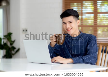 ストックフォト: Young Man Drinking