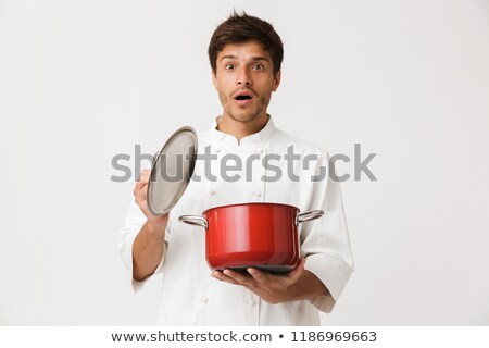 Stockfoto: Excited Young Chef Man Standing Isolated Over White Wall Background