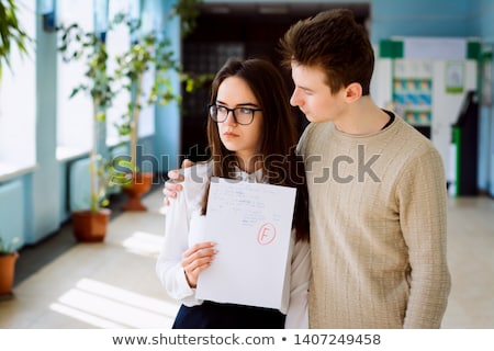 Stok fotoğraf: Young Students Campus Or Classmates With Helps Friend Studying F