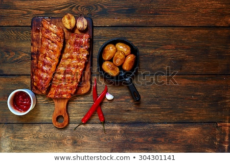 Foto stock: Chef Seasoning A Lamb Steak