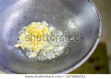 Foto stock: Garlic In Frying Pan