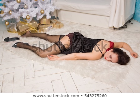 Foto stock: Killer With Dead Woman Lying On The Floor