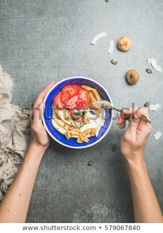 Сток-фото: Hands Holding A Bowl Of Strawberries