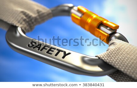 Foto stock: Chrome Carabine Hook With Text Reliability