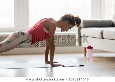 Stok fotoğraf: Sportive Girl Posing In Gym