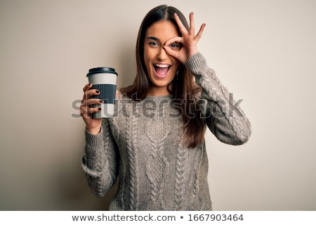 Stock photo: Beautiful Woman Holding Cup Of Coffee