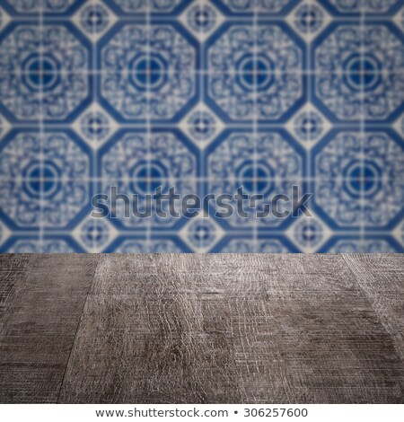 Stock photo: Wood Table Top And Blur Vintage Ceramic Tile Pattern Wall