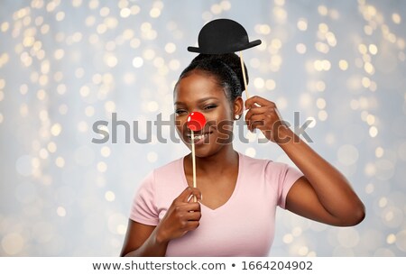 Foto d'archivio: African Woman With Bowler Hat Party Accessory