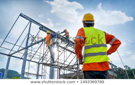 ストックフォト: Construction Worker Checking Plans