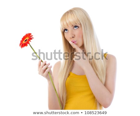 Foto d'archivio: Woman Giving Silence Gesture Holding Daisy