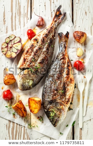 Stok fotoğraf: Sea Bream Fish Grilling On Bbq