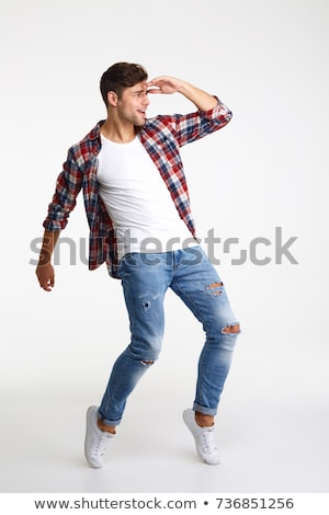 Zdjęcia stock: Casual Man With Hand On His Forehead Looking Far Away