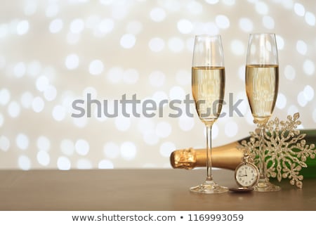 Zdjęcia stock: Champagne Bottle Glasses And Christmas Decor