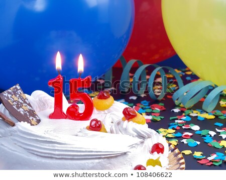 Zdjęcia stock: Birthday Cake With Burning Candle Number 15