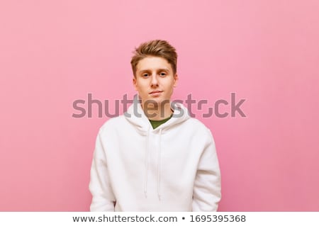 ストックフォト: Blond Cheerful Guy In Pink Shirt