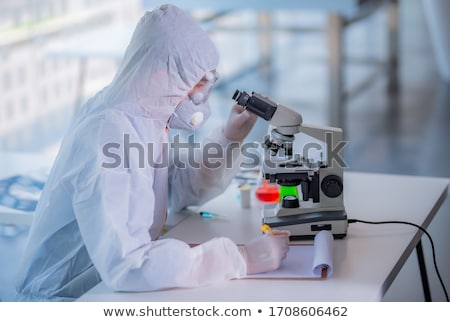 Stok fotoğraf: Male Doctor Working In The Lab On Virus Vaccine