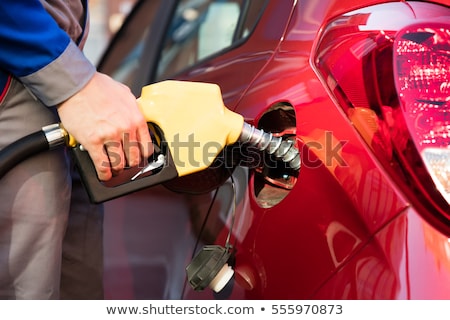 Stock photo: Car Refueling On A Petrol Station Close Up
