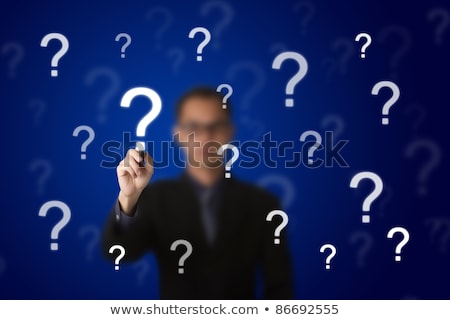 Stock fotó: Perplexed Businessman Drawing Question Marks On Whiteboard