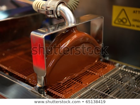 Stock photo: Confectioner With Chocolate Coating Machine