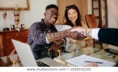 Stockfoto: Real Estate Broker Agent And Customer Shaking Hands After Signin