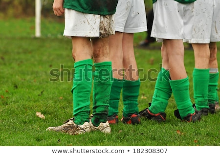 Stock photo: Young Boys In Football Team Listening To Coach