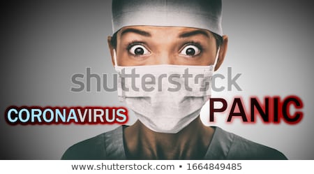 Zdjęcia stock: Coronavirus Panic Text Title Over Scared Doctor Having Corona Virus Epidemic Fear Wearing Face Mask