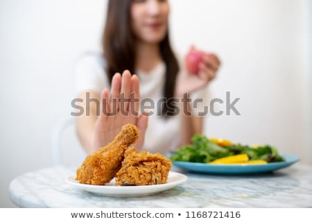 Stockfoto: Woman On Diet Refuses To Eat For Lunch