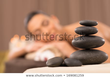 Zdjęcia stock: Beautiful Model At Wellness Massage With Hot Stone