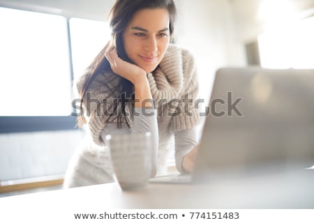 Stockfoto: Middle Woman In Modern Kitchen