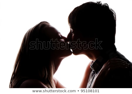 Imagine de stoc: Passionate Couple In Casuals Kissing Each Other