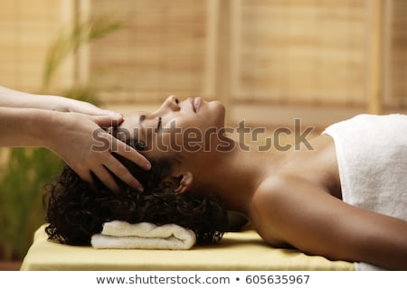 Stock photo: Side View Of A Beautiful Woman On Massage Table