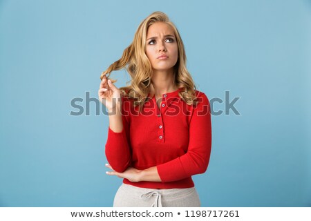 [[stock_photo]]: Portrait Of Upset Blond Woman 20s Wearing Red Shirt Touching Her