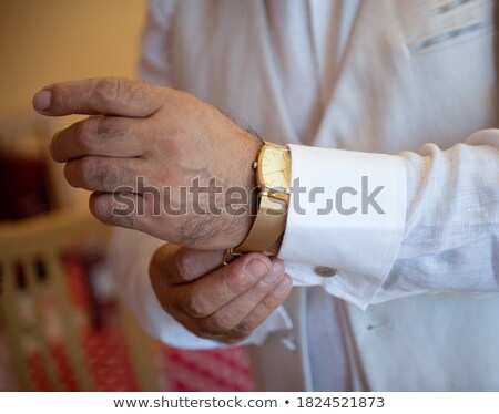 Foto stock: Elegant Man Arranging His Cuff