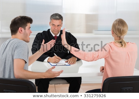 Stock foto: Couple Sitting In Front Of Judge
