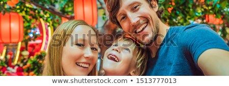 Сток-фото: Happy Family Celebrate Chinese New Year Look At Chinese Red Lanterns Banner Long Format